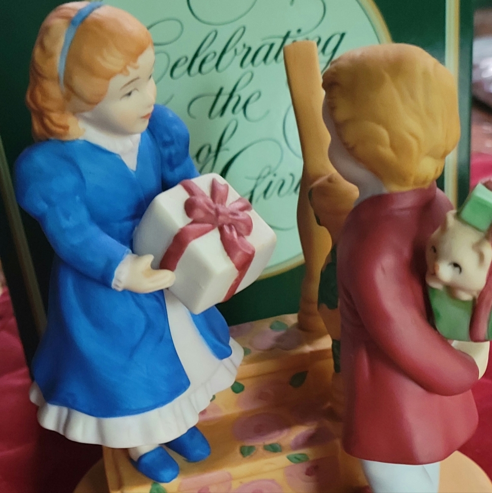 Avon 1984 "Joy of Giving" Porcelain Figurine.